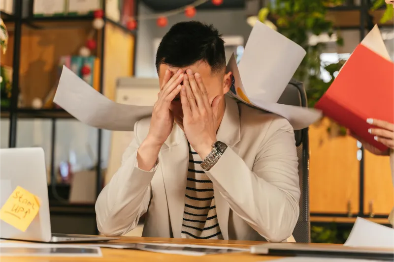 Adult navigating emotional stress and seeking therapy support